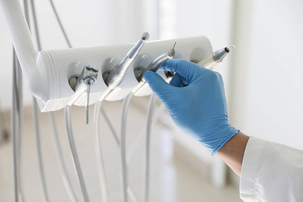 Professional Tooth Extraction technician working in Lely, FL